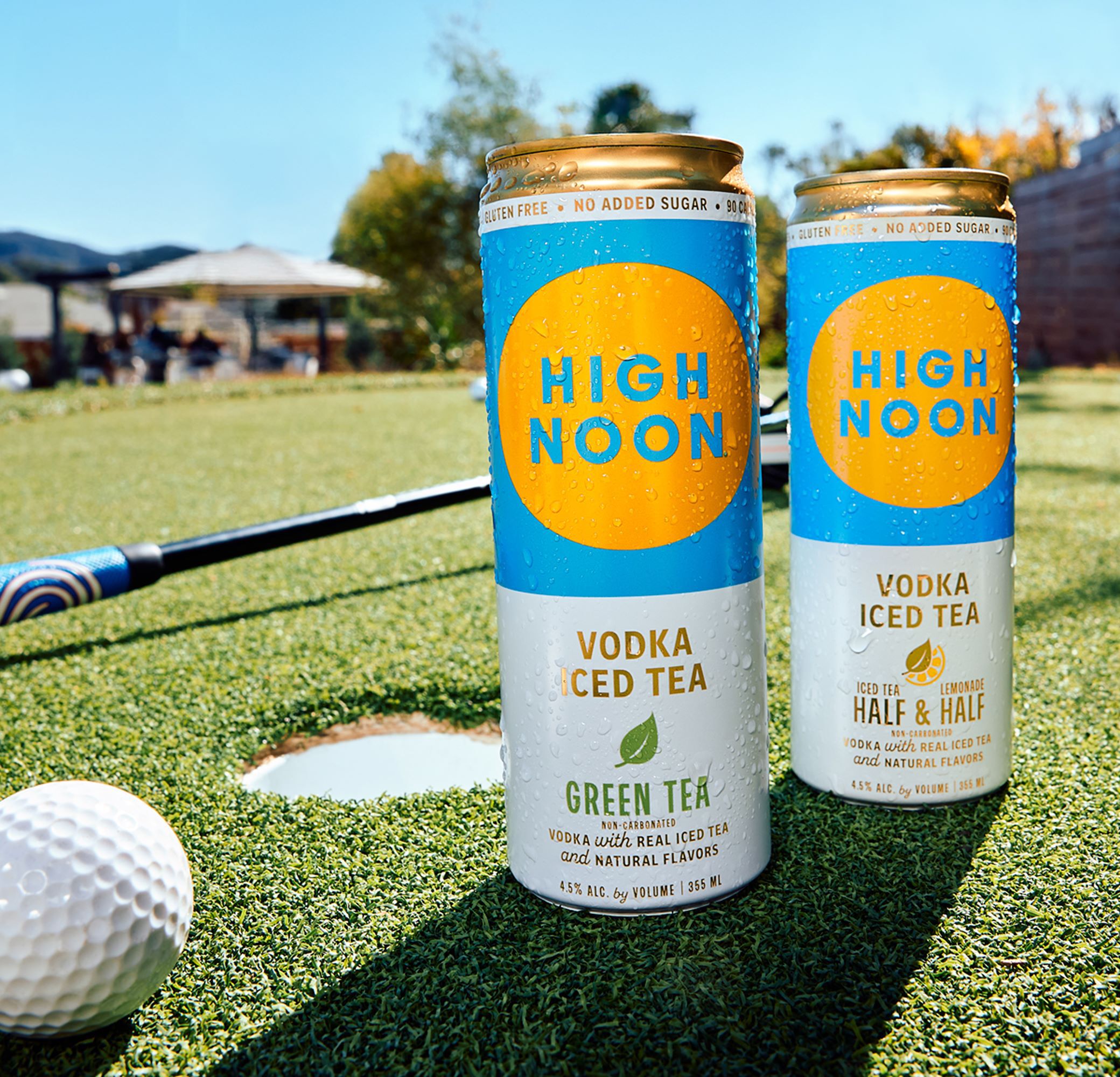 High Noon Vodka Iced Tea Cans on Putting Green